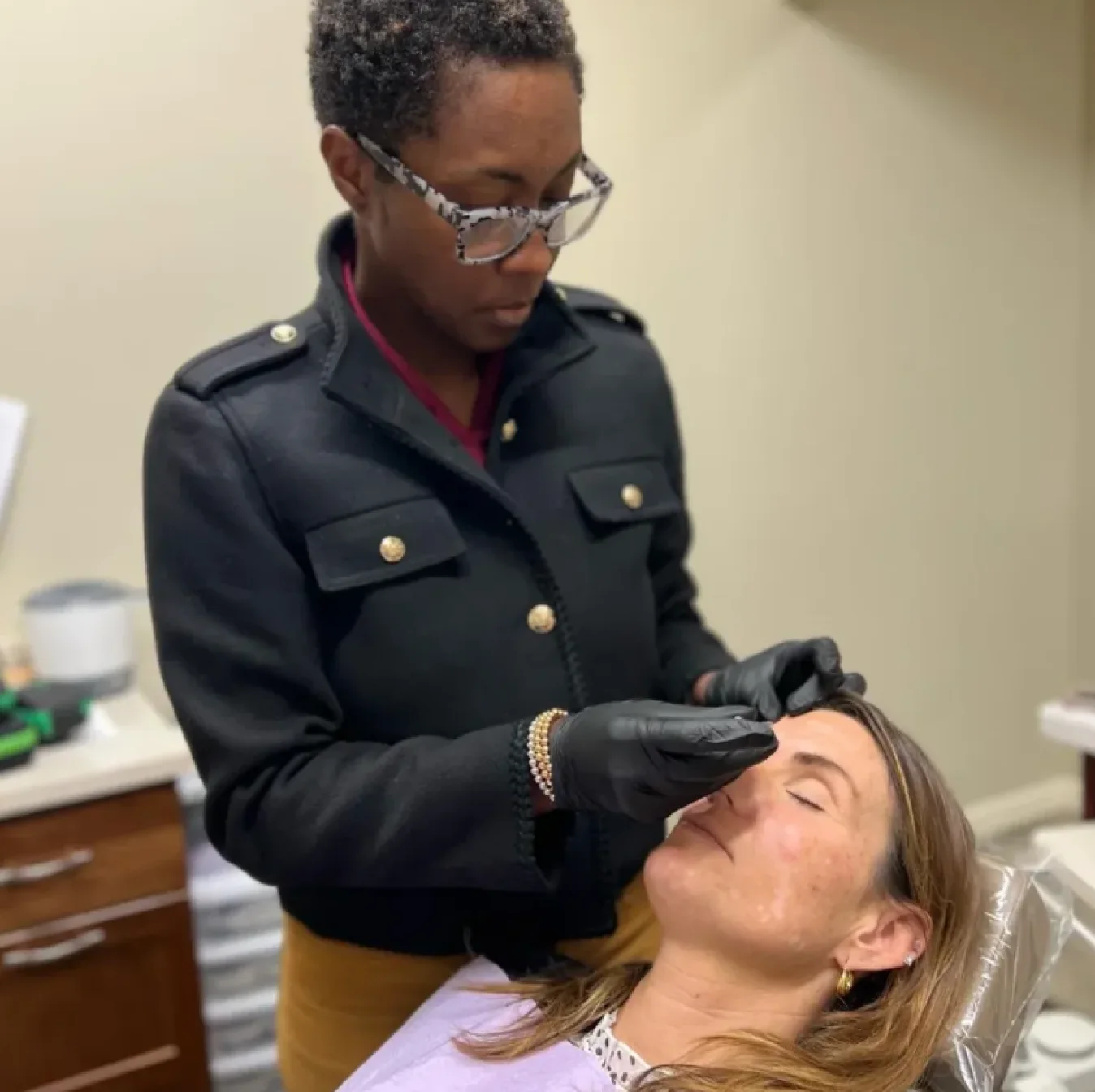 Dr. Silva performing an aesthetic treatment